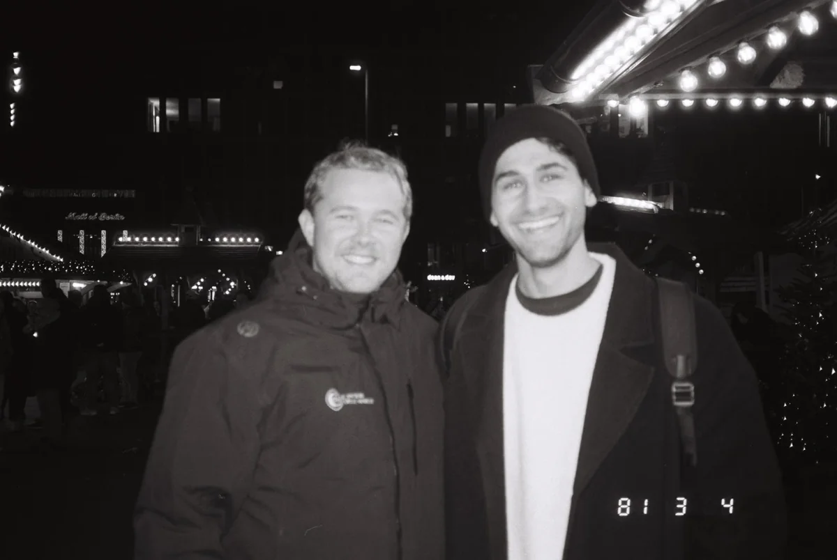 Coffi's founders, Ben and Gilad, together at night, in black and white